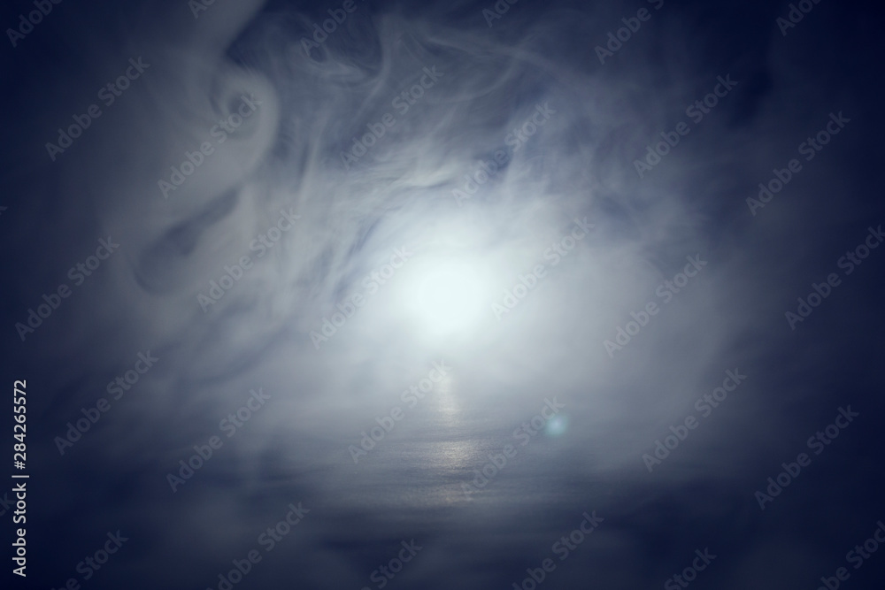 Abstract smoke steam moves on a black background . The concept of aromatherapy.