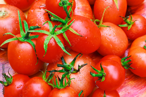 background of red fresh homemade tomatoes