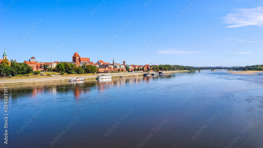Panoramic view of Torun city and Wisla (Vistula) river with bridges. Poland, summer 2019