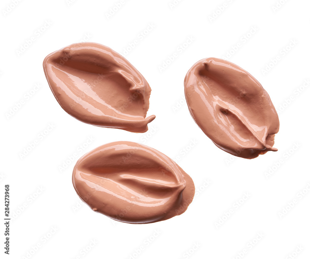 Gently beige strokes and texture of makeup foundation or acrylic paint isolated on white background Gently beige strokes and texture of makeup foundation or acrylic paint isolated on white background