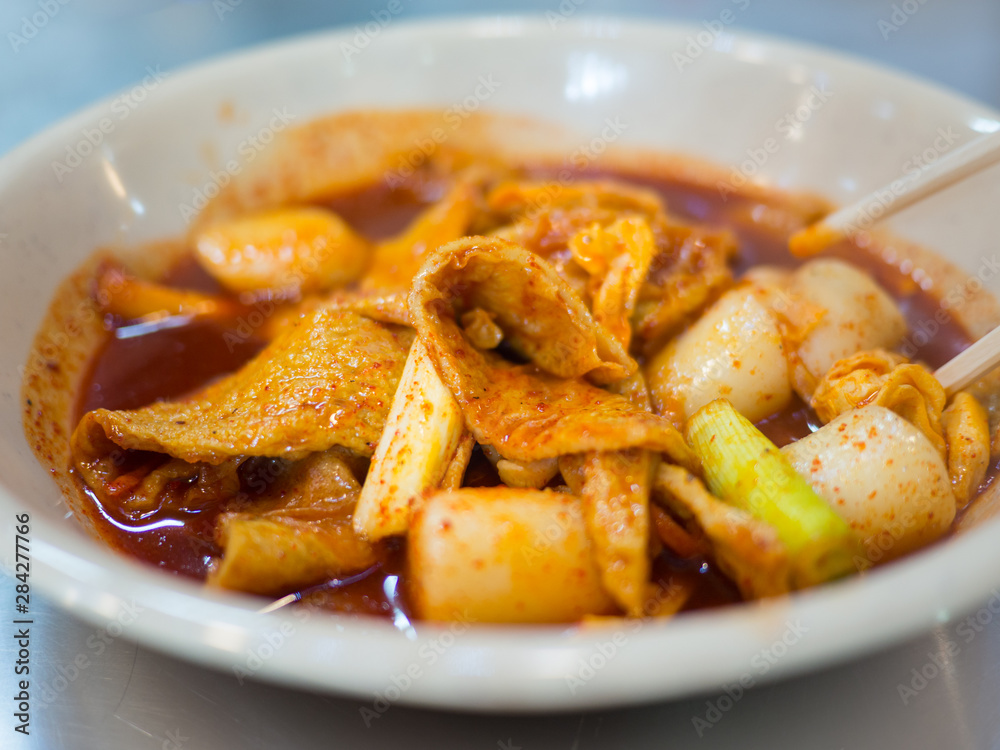Tteokbokki or ddukbokki Spicy Stir-fried Rice Cakes is Korean popular street foods style Tteokbokki or ddukbokki Spicy Stir-fried Rice Cakes is Korean popular street foods style