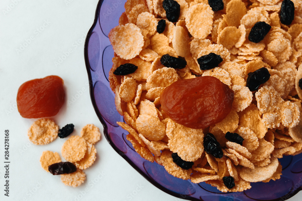Fototapeta premium cereal breakfast with honey berries and fruits