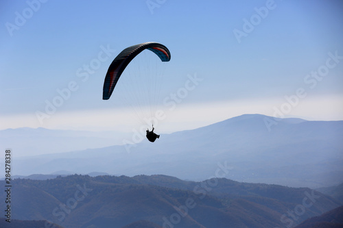 flying paraglider in air