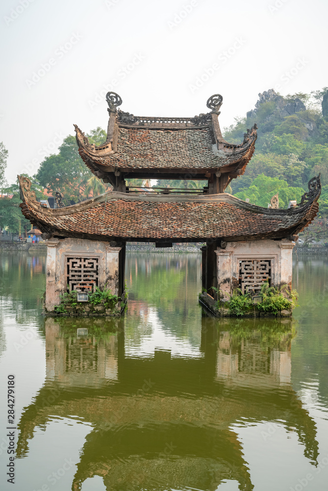 Floating temple in Thay Pagoda or Chua Thay, one of the oldest Buddhist pagodas in Vietnam, in Quoc Oai district, Hanoi Floating temple in Thay Pagoda or Chua Thay, one of the oldest Buddhist pagodas in Vietnam, in Quoc Oai district, Hanoi