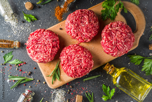 Raw minced meat beef burger cutlets photo