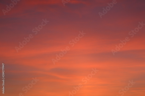 Sky at sunset. Photo red pink evening sky. © Iuliia