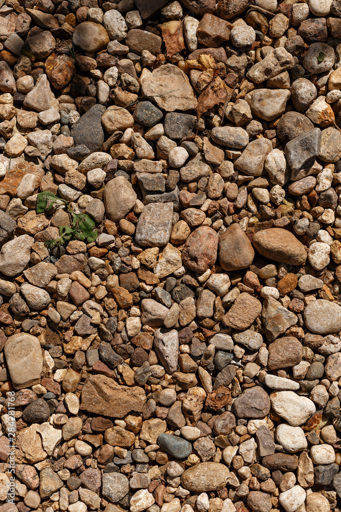 Many little brown stones texture background Many little brown stones texture background