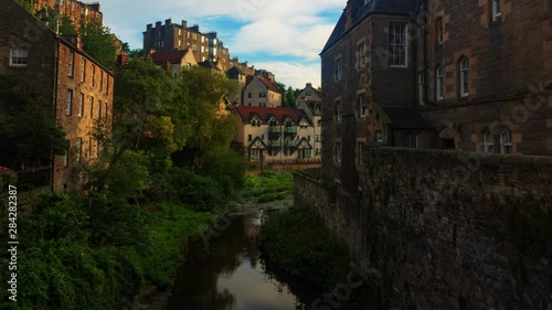 Time lapse view of Dean village in Edinburgh (Scotland) at sunset photo