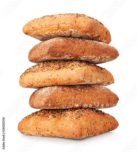 fresh baked pile of bread isolated on white.