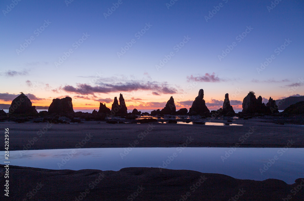 串本海岸橋杭岩の日の出stock Photo Adobe Stock