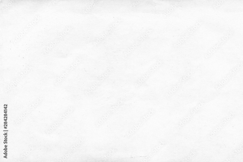 Naklejka premium Cardboard white texture close-up. Light old paper background. Grunge concrete wall. Vintage blank wallpaper.