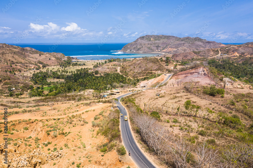 Aerial view of the road leading to the Are Guling beach in Kuta, South Lombok in Indonesia