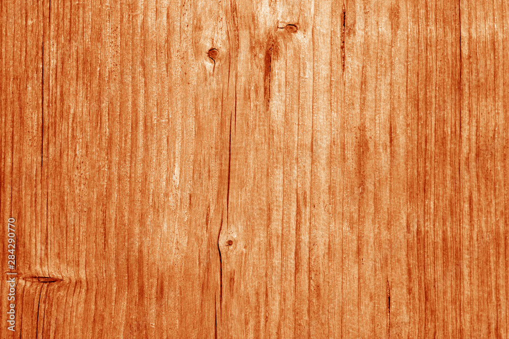 Wooden board texture in orange tone. Wooden board texture in orange tone.
