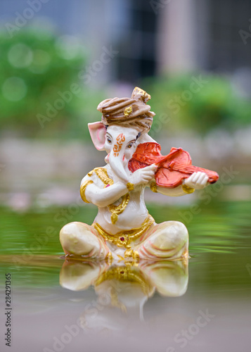 Lord Ganesha with violin photo