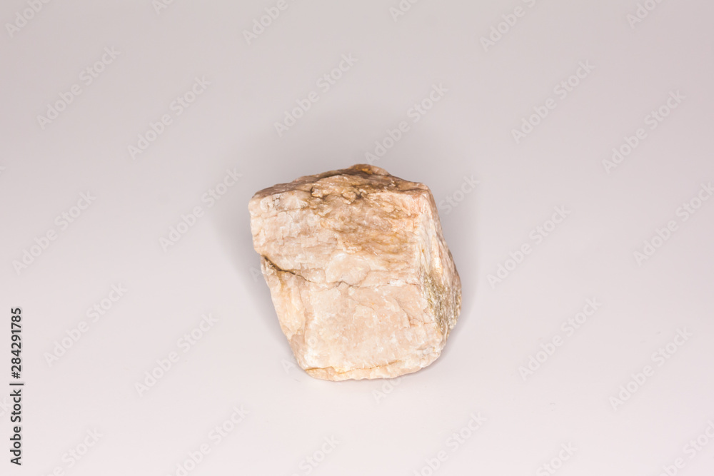 Natural beige stone isolated on white background Natural beige stone isolated on white background