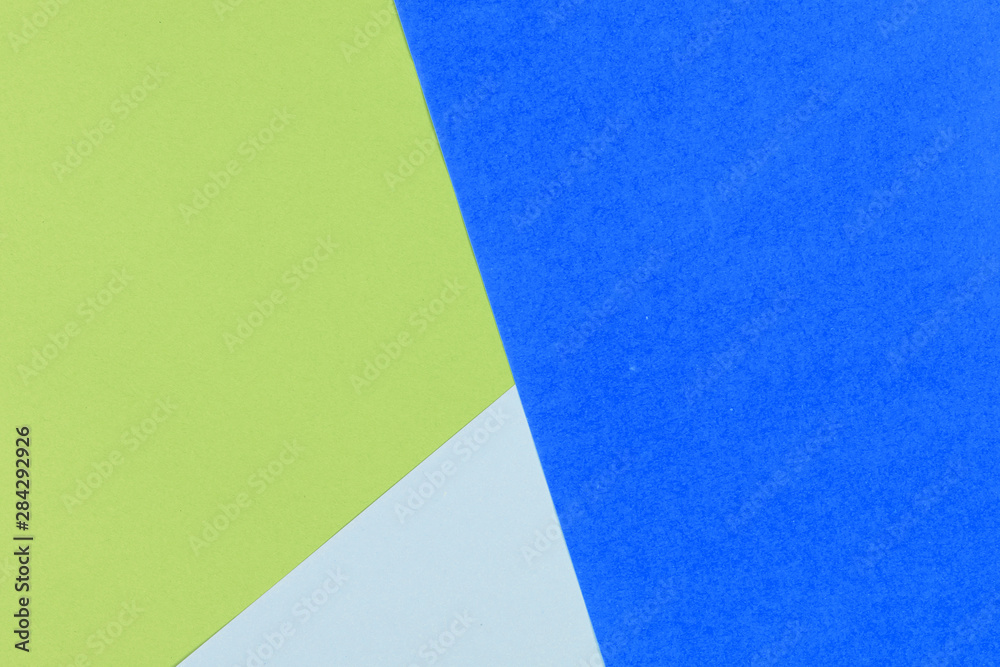 Paper empty blue, yellow, pastel background, geometrically located. Color blank for presentations, copy space.