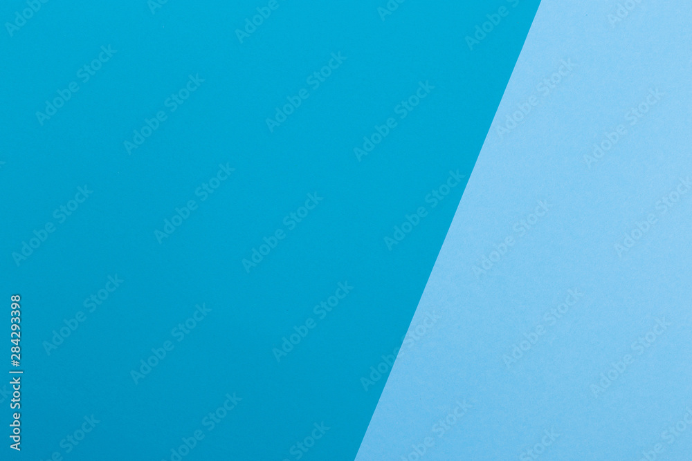 Paper blue empty background, geometrically located. Color blank for presentations, copy space.