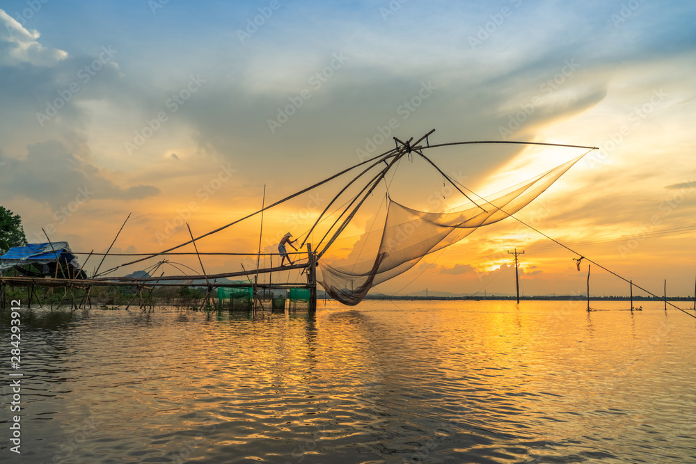 Mekong Delta landscape with big fishing net in floating water season in Chau Doc, An Giang province, Mekong Delta, South Vietnam