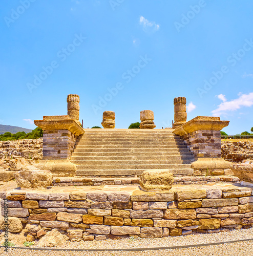 Remains of the Temple of Jupiter, one of the three temples of the Capitoline Triad terrace. Baelo Claudia Archaeological Site. Tarifa, Cadiz. Andalusia, Spain.