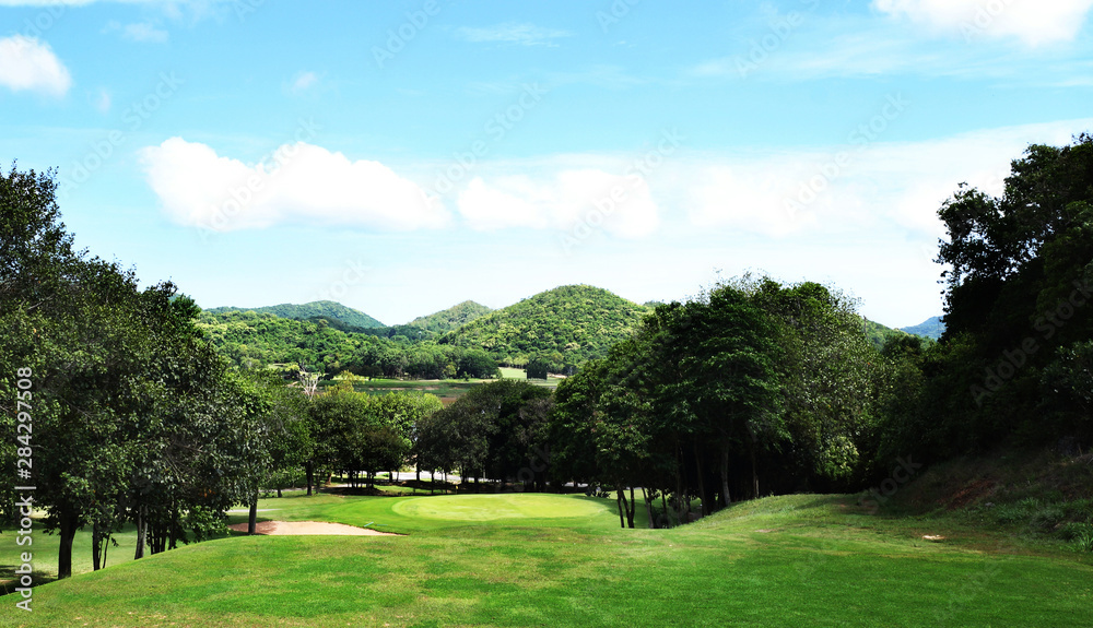 golf course or green grass field in urban public park