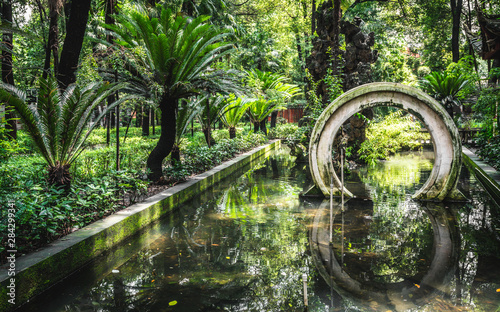 Scenic view of a traditional Chinese garden with water pound at the garden of the Wenshu Monastery in Chengdu China photo