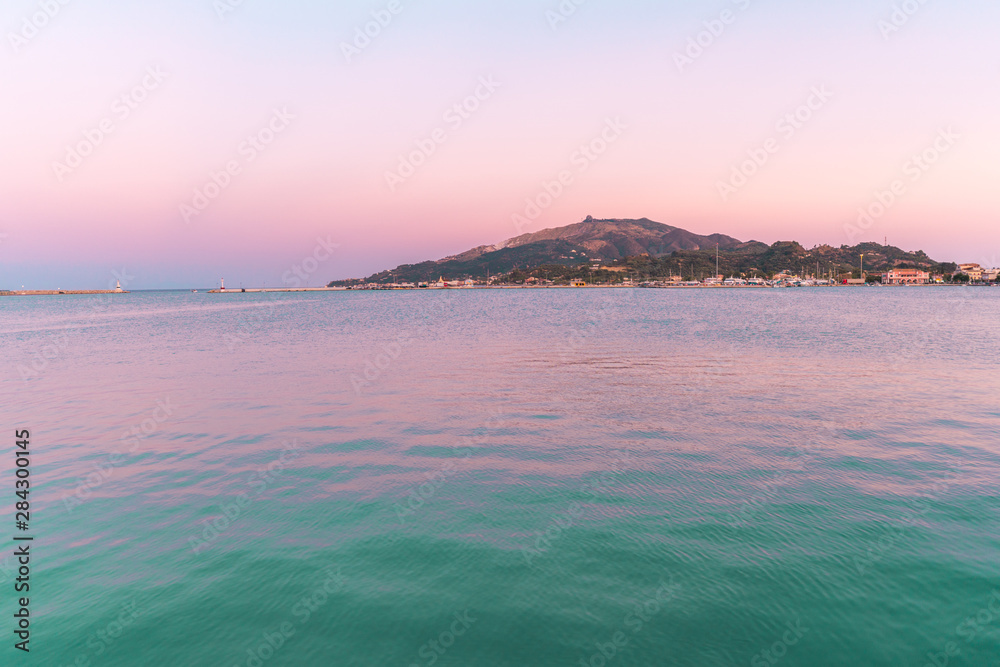 Fototapeta premium Stunning morning view of beach of Zakynthos (Zante) island. Sunny spring seascape of the Ionian Sea, Greece, Europe. Beauty of nature concept background.