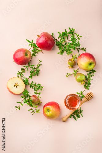 Rosh Hashana, jewish new year holiday concept, honey, apple, pomegranate