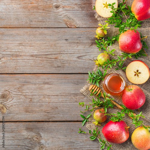 Fotografie Rosh Hashana, jewish new year holiday concept, honey, apple, pomegranate