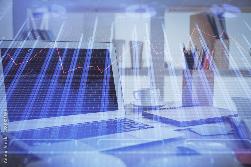 Double exposure of chart and financial info and work space with computer background. Concept of international online trading. Double exposure of chart and financial info and work space with computer background. Concept of international online trading.