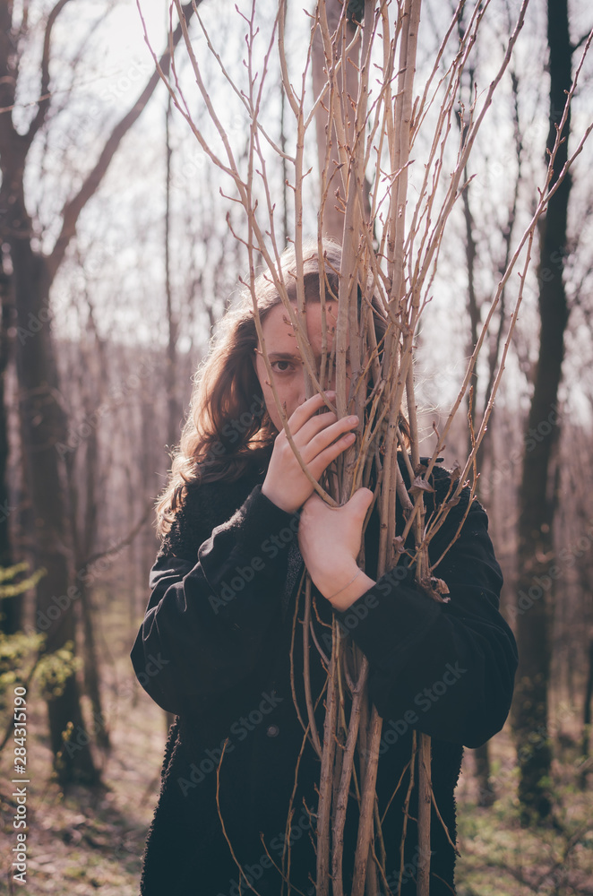 Woman hugging trees before planting