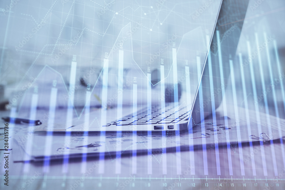 Forex Chart hologram on table with computer background. Double exposure. Concept of financial markets.