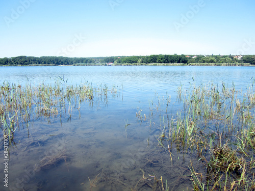 landscape with lake and blue sky