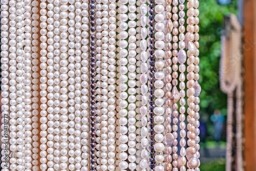 Pearl beads. Round river pearls. Pearl background.