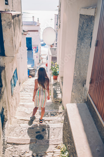 Adorable little girl in european city outdoors © travnikovstudio