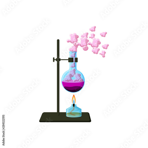 Scientific laboratory experiment. Chemical beaker with boiling liquid and vapor and alcohol burner.