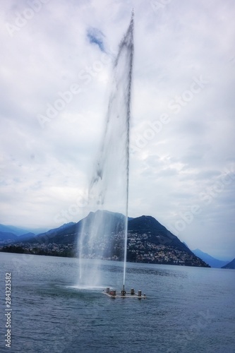 Fountain in the water on lake Lugano