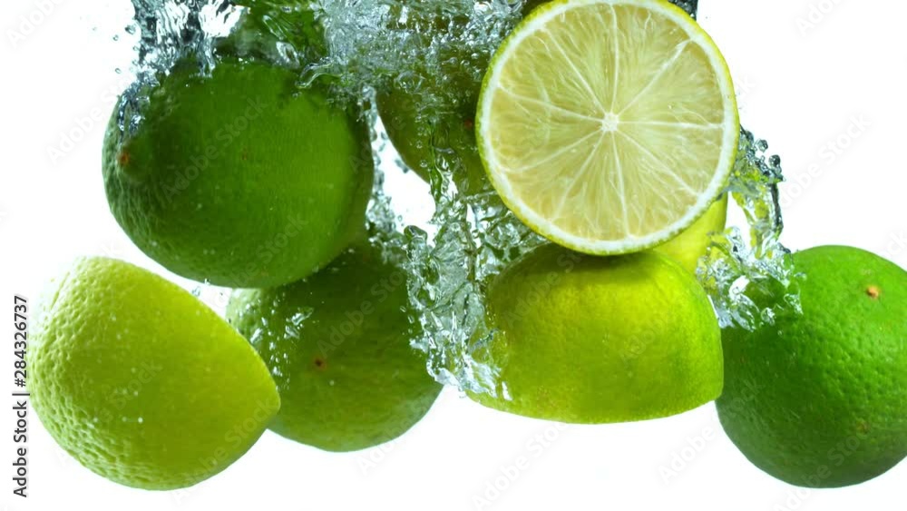 Super Slow Motion Shot of Falling Limes into Water at 1000fps. Shooted with High Speed Cinema Camera at 4K