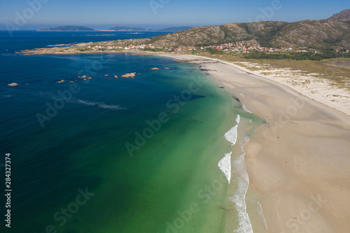 ocean waves, sandy beach, view from drone, Carnota beach, Galicia, Spain photo