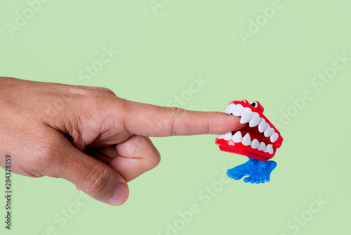 Εκτύπωση καμβά funny denture biting a finger