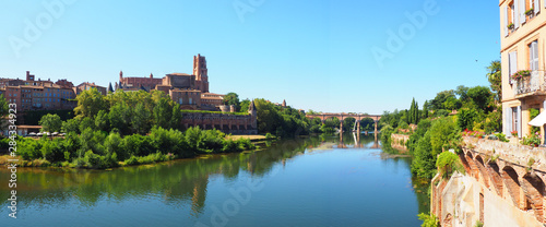 panoramic view of the Sainte Cécile cathedral and Pont-Vieux (Old Bridge) on the river Tarn in Albi in Occitanie (South of France).