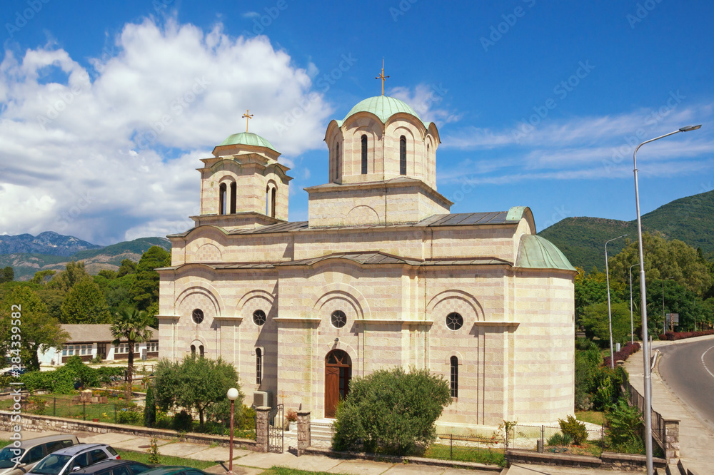 Religious architecture. View of Serbian Orthodox Church of St. Sava on sunny summer day. Tivat city, Montenegro