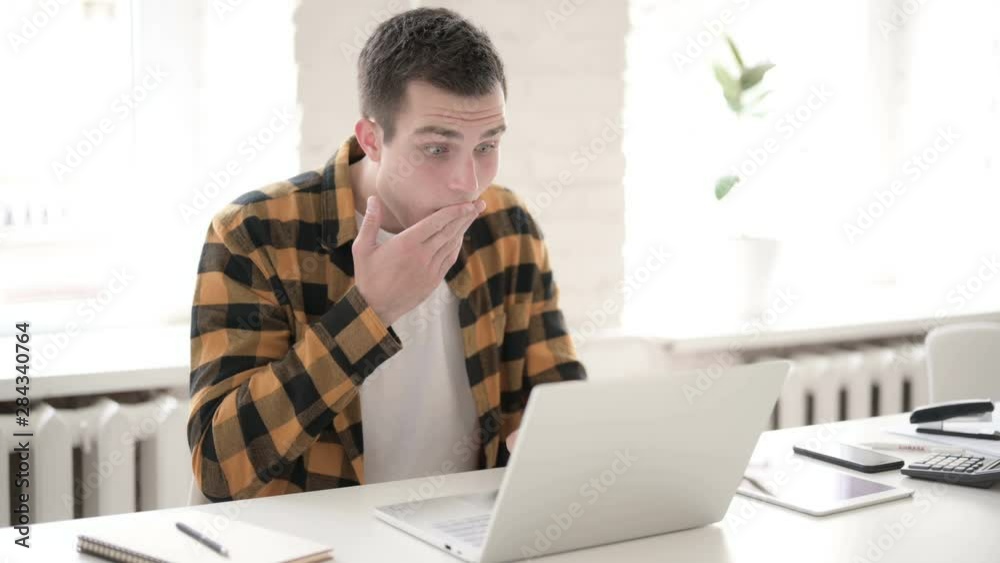 Shocked Casual Young Man in Awe at Work Shocked Casual Young Man in Awe at Work
