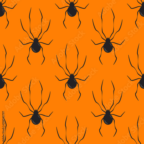 Vector seamless pattern with spiders on orange background 