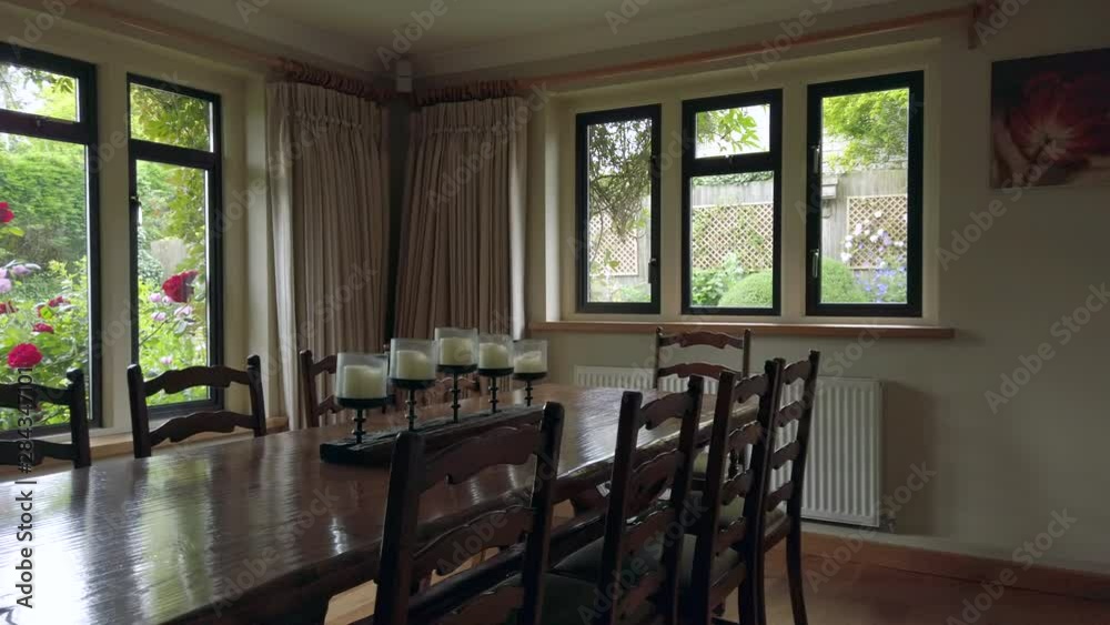 Right to Left Pan of a Rustic Dining Room in a Family Home Right to Left Pan of a Rustic Dining Room in a Family Home