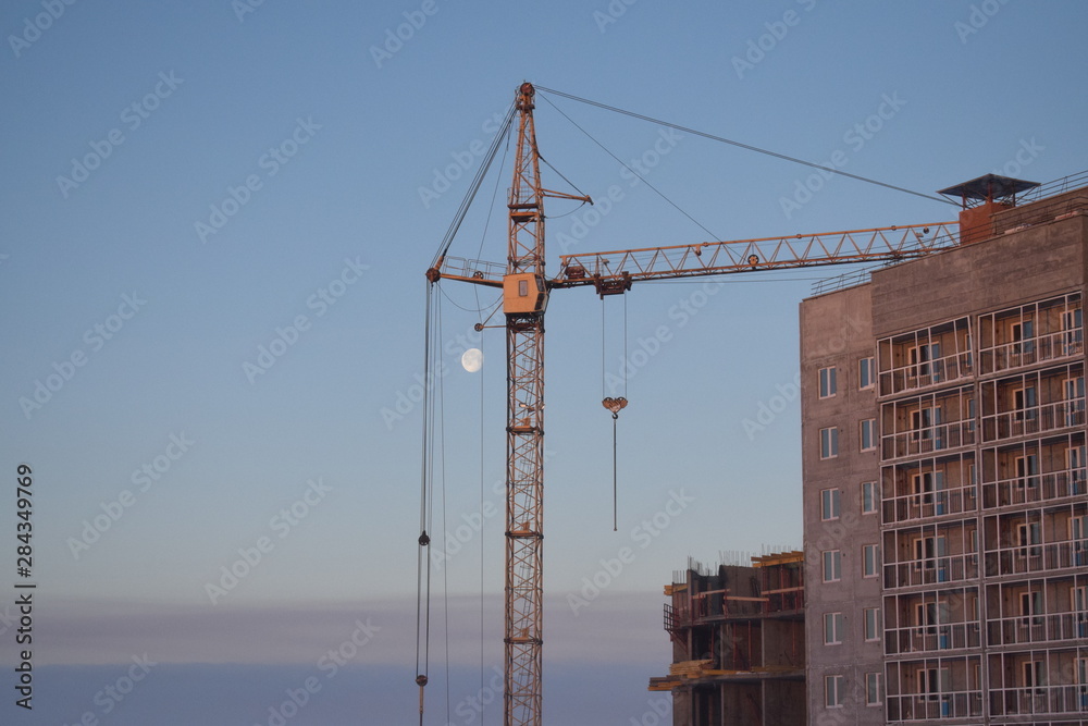 Crane and building construction.
