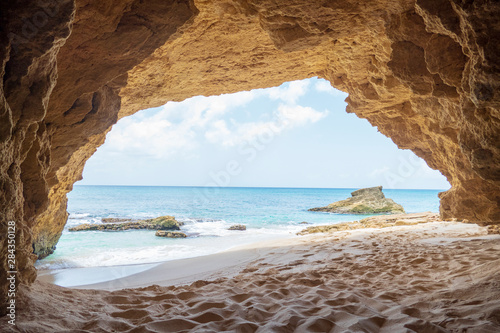 The natural caves at cupecoy beach on the beautiful island of St.Maarten/St.Martin photo
