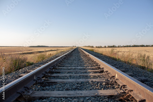 railway tracks go into the horizon