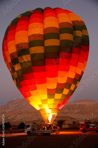 Africa, Egypt, Luxor. Hot Air Balloon launching from Luxor Egypt over the Valley of the Kings.