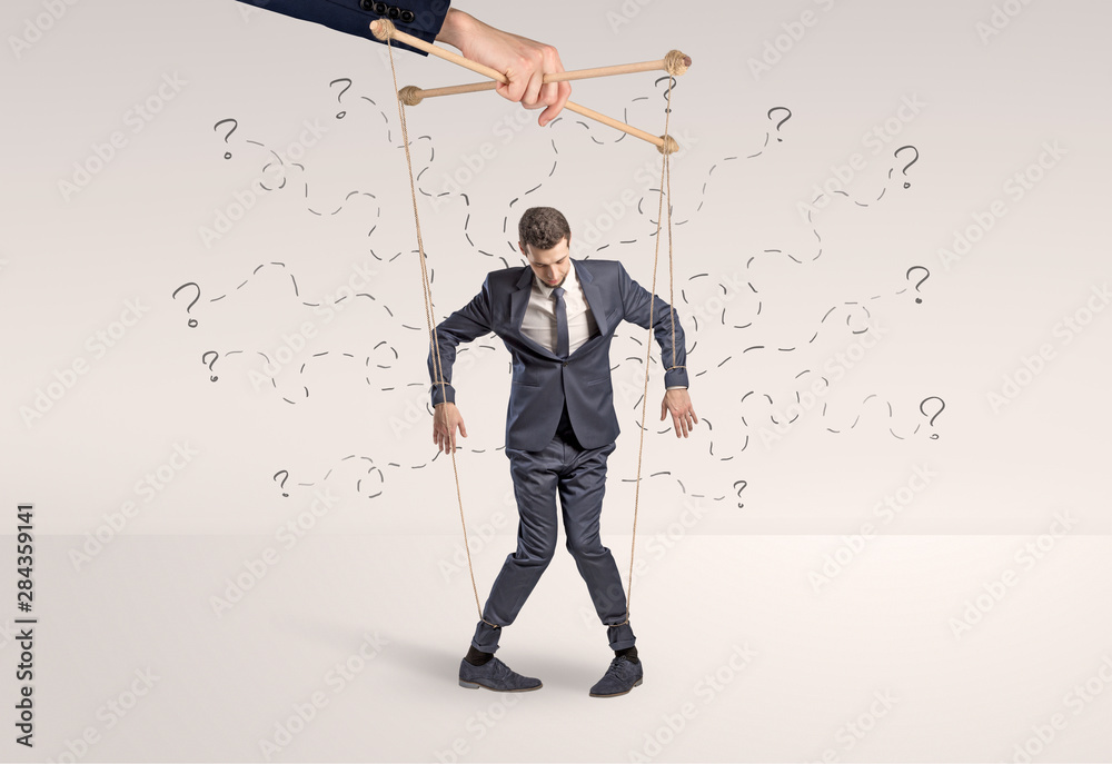 Marionette businessman with doodle lines and arrows around him Marionette businessman with doodle lines and arrows around him