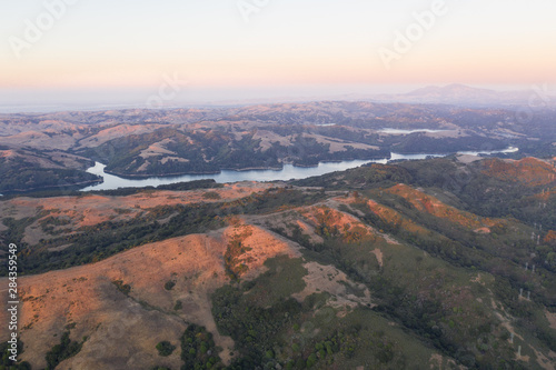 Evening light illuminates the hills, ridges, and canyons found in the East Bay near Berkeley, Oakland, and not far from San Francisco in northern California.